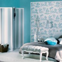 Turquoise wallpaper in the bedroom of a country house