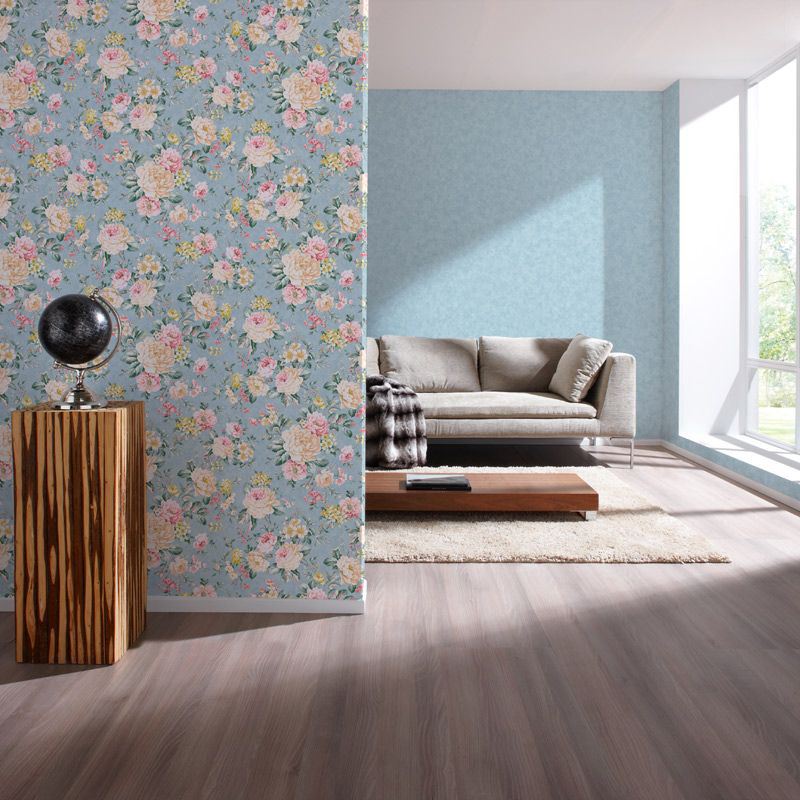 The combination of blue wallpaper with floral patterns