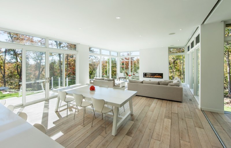 Combined kitchen-dining room in a private house with panoramic windows