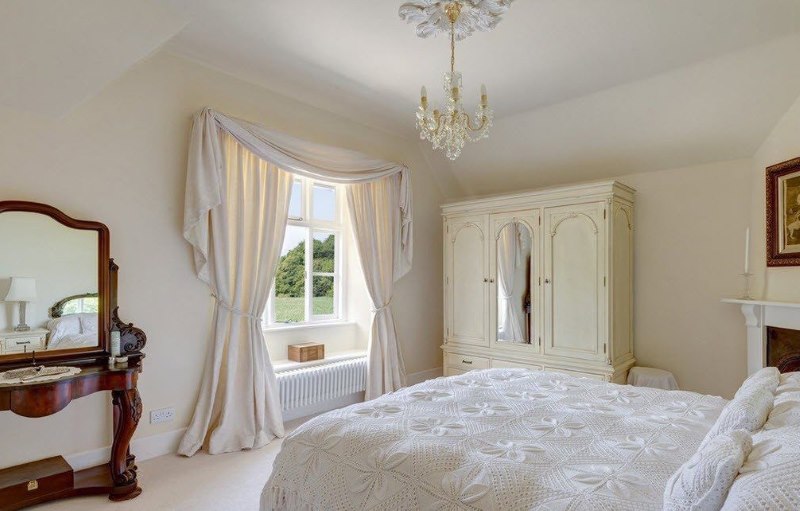 Classic bedroom in creamy shades