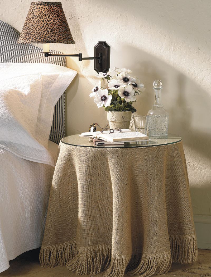 Fresh flowers on a burlap tablecloth