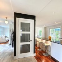 Black framing around a white door