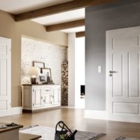 Wooden beams on a white ceiling