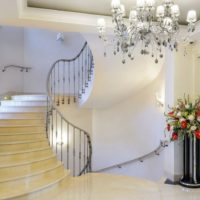 Chandelier in the interior of the hall of a private house