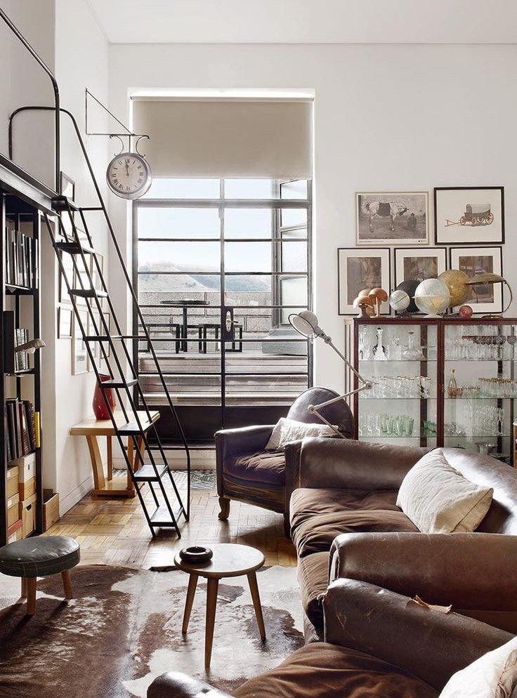 Modern living room with brown sofa