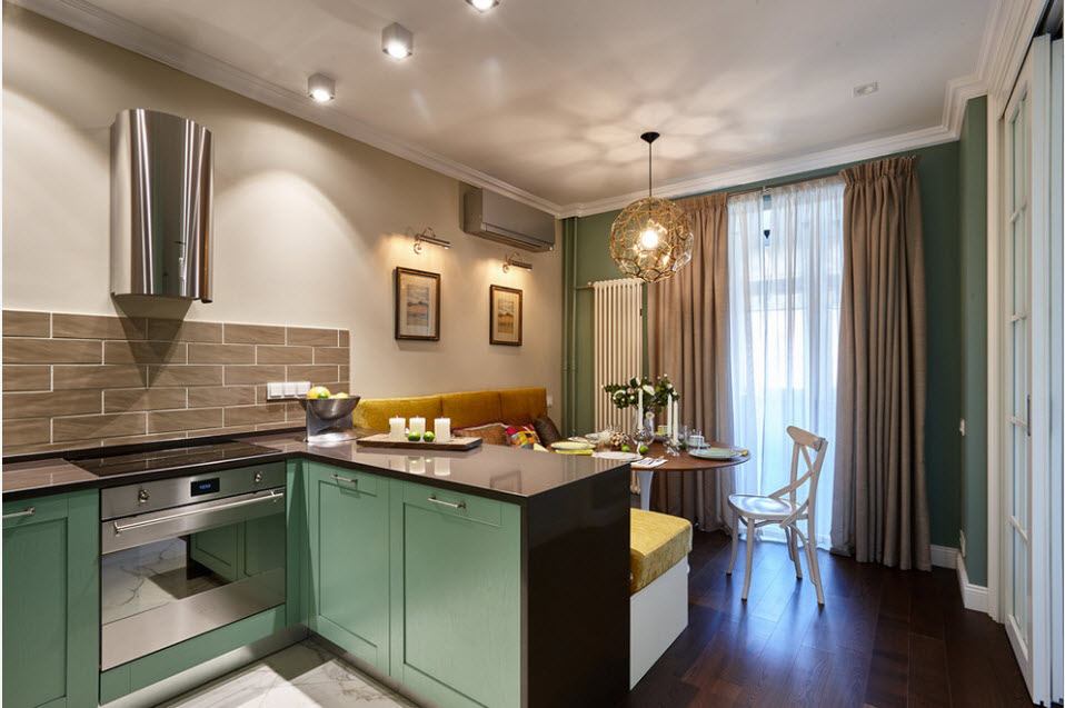 The bar counter in the role of zoning in the kitchen-living room