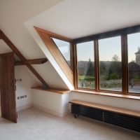 Wooden bench on a heating radiator