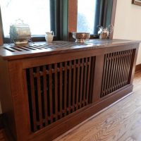 Wooden screen in front of the window in the classic style bedroom