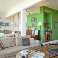 Green walls in a room with a white ceiling