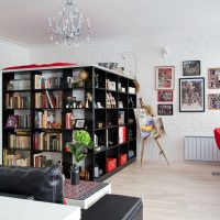 Separation of the sleeping area with book racks