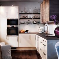 Corner kitchen unit with beige facades