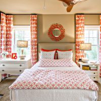 Red and white textile in the design of the bedroom