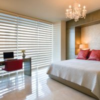 Crystal chandelier on the bedroom ceiling