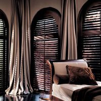 Wooden windows in a dark living room