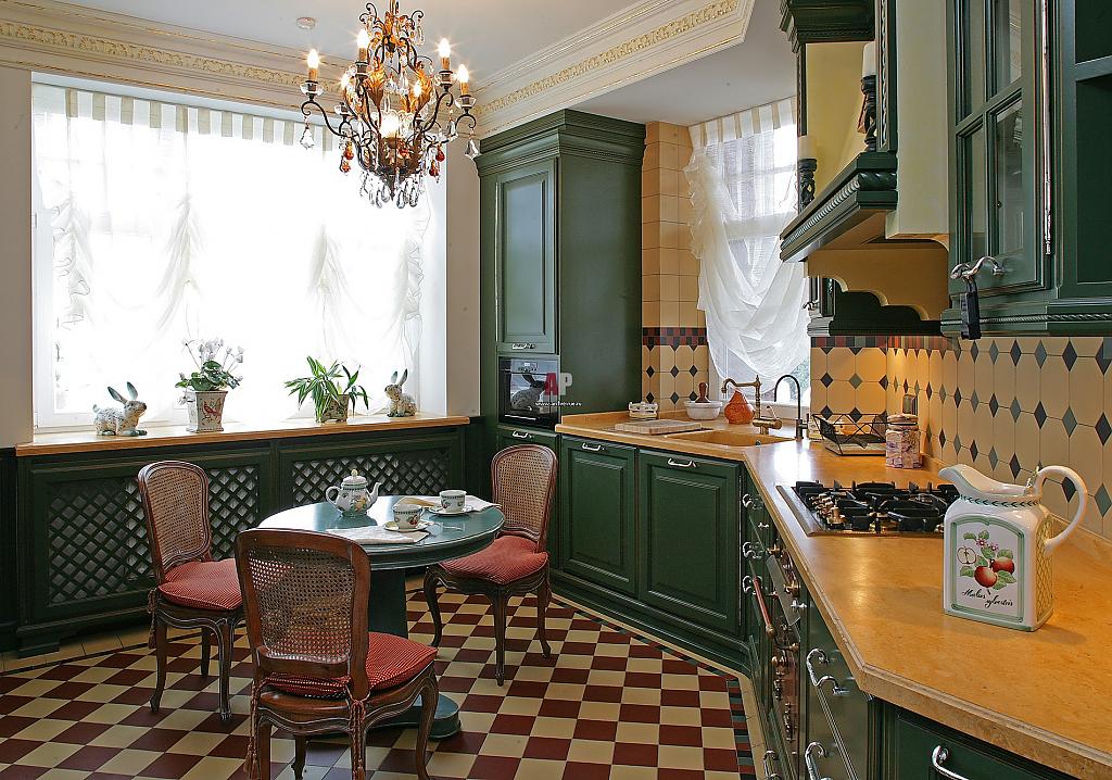 Dark green facade of a kitchen set