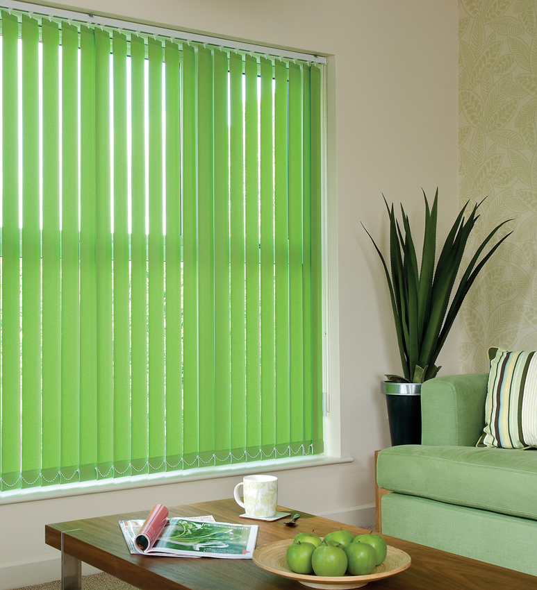 Light green blinds in the window opening