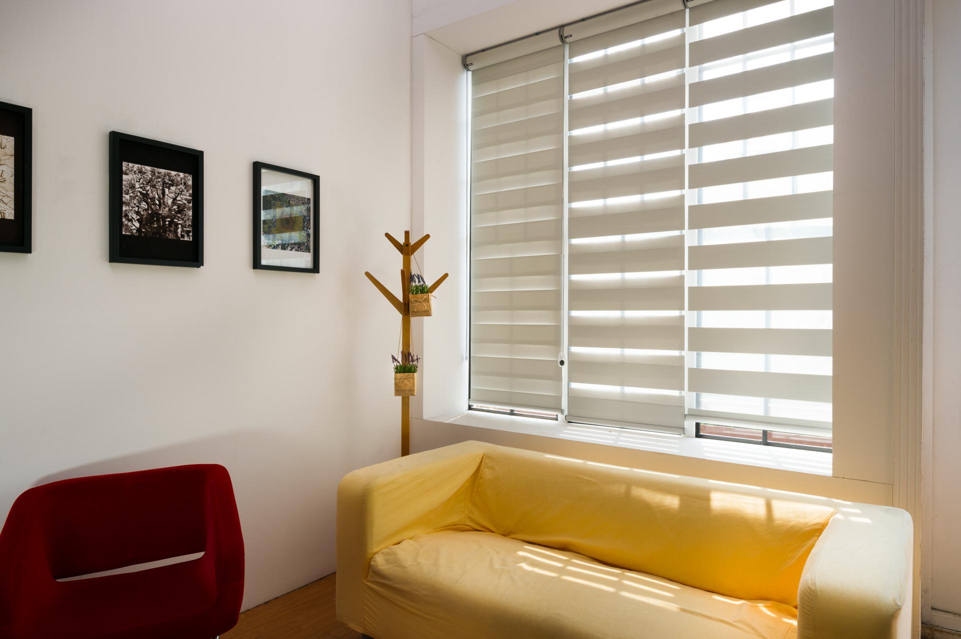 Zebra-type roller blinds on a living room window