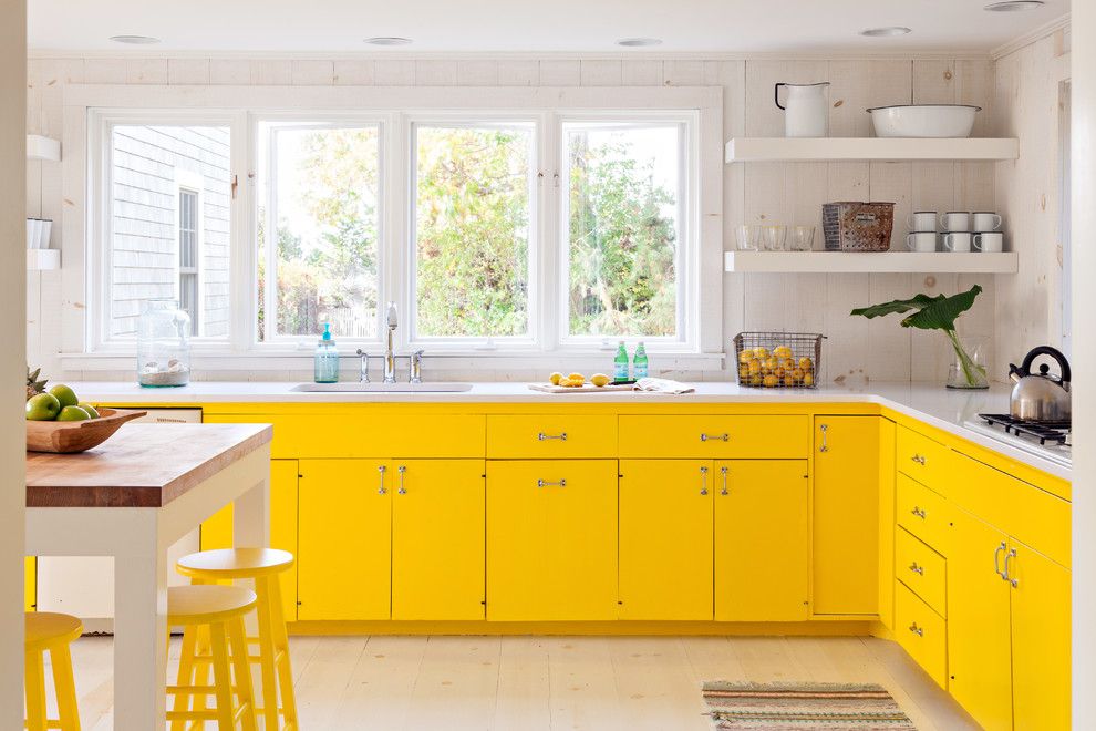 Yellow chairs in the interior of the kitchen-dining room