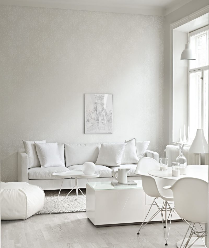 Interior of a snow-white living room in a private house