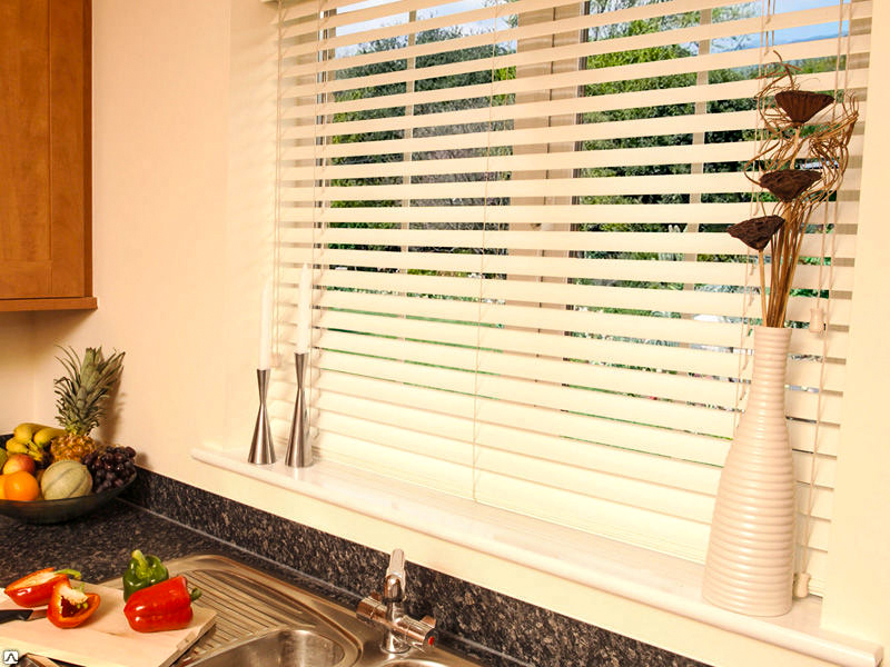 White plastic blinds on the kitchen window