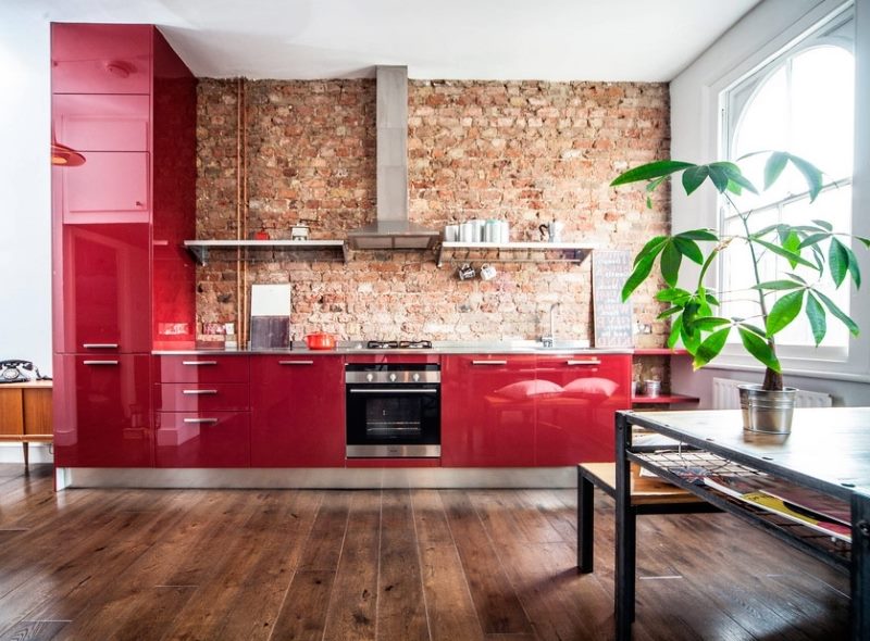 Loft style red kitchen interior