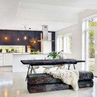 Wooden furniture in the interior of the kitchen of a private house