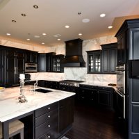 Sink in the marble countertop of the kitchen island