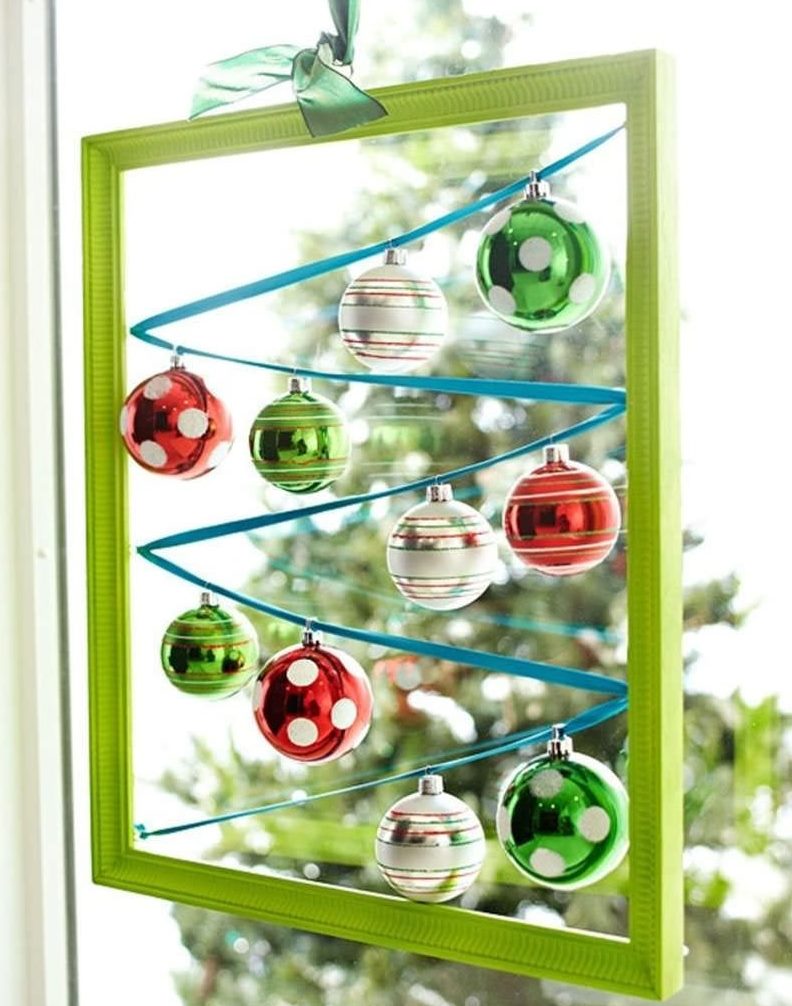 Green frame with Christmas toys