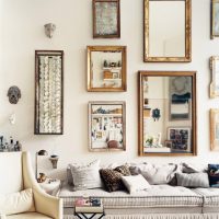 Wall decoration over the sofa mirrors