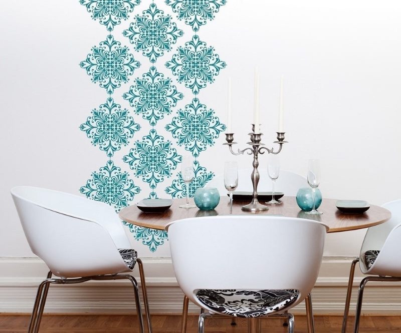 Turquoise ornament on a white wall