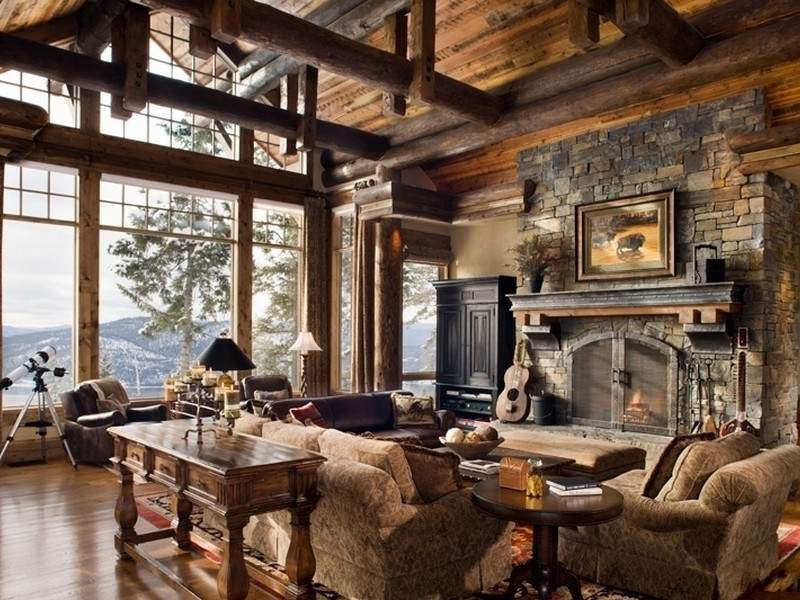 Large panoramic window in the living room of a wooden house