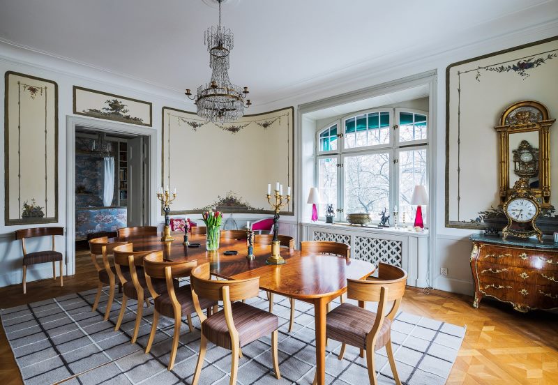 Dining table in the spacious dining room of a private house