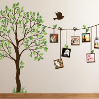 Wall in a nursery with a painted tree