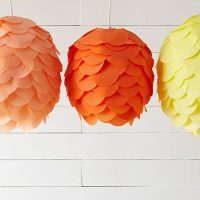 Three multi-colored lamp made of paper petals