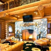 Stone fireplace in the living room of a private house