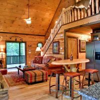 Living room hall with wooden staircase