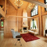 Beams made of logs in the living room of a private house