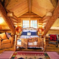 wooden bed in the attic bedroom