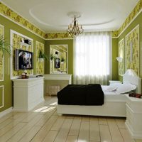 White furniture in a room with green walls