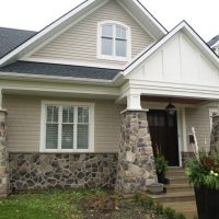 Concrete columns with stone cladding