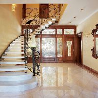 Doors with stained-glass windows in the interior of the entrance hall