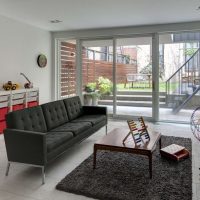 Black sofa on a white floor