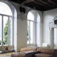 Living room interior with arched windows