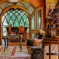 Elements of the Gothic style in the interior of the living room of a private house