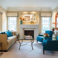 Blue armchairs in the main room of a private house