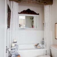 Wooden curtain rod in the bathroom