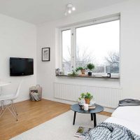 Window in the living room of a private house without curtains