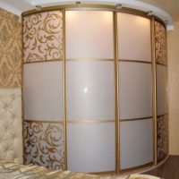 Golden ornaments on glass cabinet doors