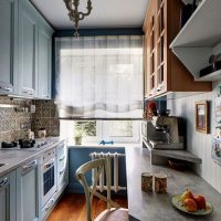 Candlestick-shaped chandelier on the kitchen ceiling