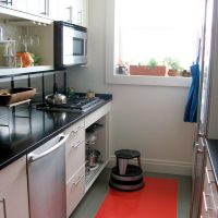 Red floor in the interior of the kitchen